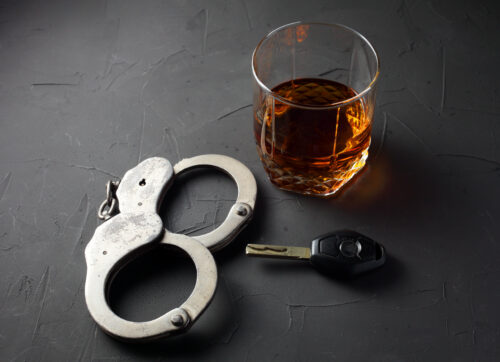 DUI DWI handcuffs alcohol car keys