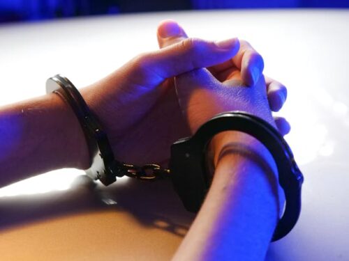 hands in handcuffs