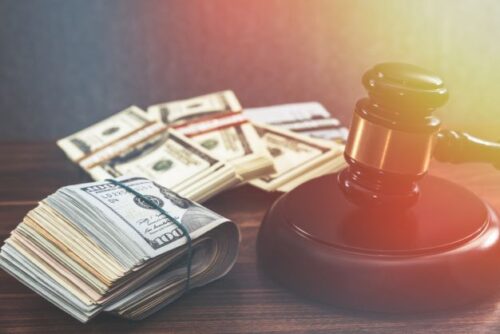 money and gavel compensatory damages